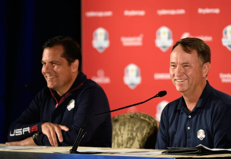 Derek Sprague (L), president PGA of America and US Ryder Cup captain Davis Love speak at the Ryder Cup Team USA Captain's Picks Press Conference