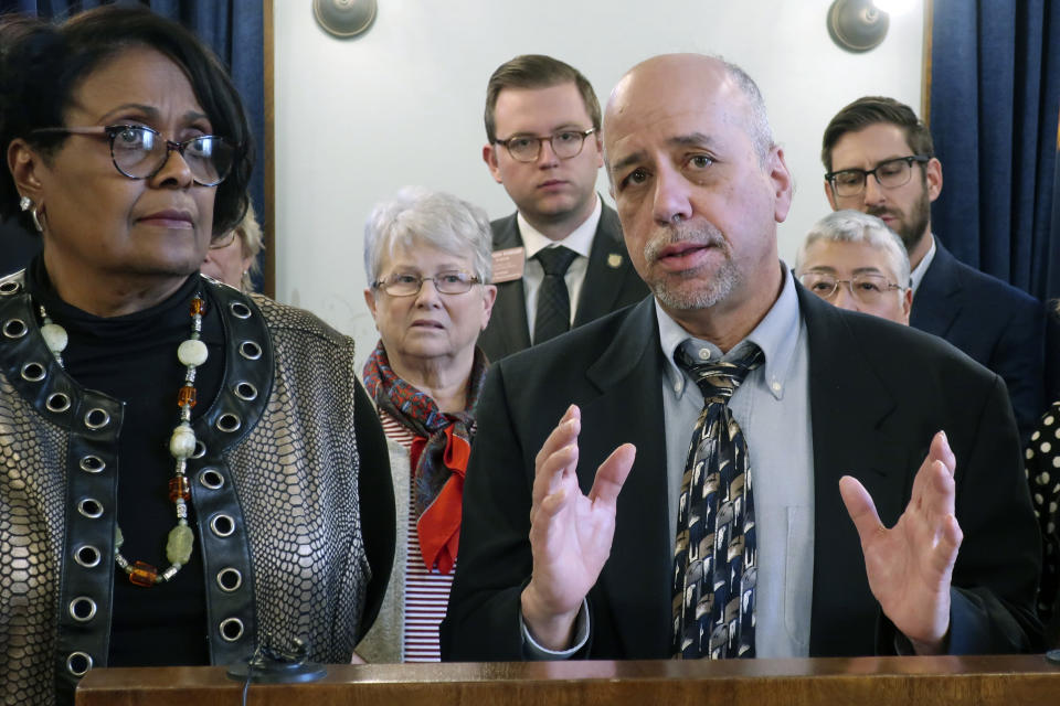 Kansas House Minority Leader Tom Sawyer, D-Wichita, right, answers questions during a news conference following the defeat of a proposed anti-abortion amendment to the state constitution as fellow House Democrats watch, Friday, Feb. 7, 2020, at the Statehouse in Topeka, Kan. To his right is Assistant Minority Leader Valdenia Winn, D-Kansas City. (AP Photo/John Hanna)