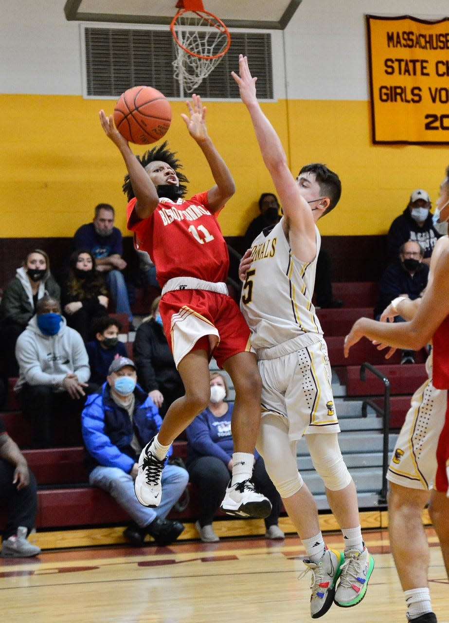 Bishop Connolly's Jah Stephenson takes an off balance shot over Case's Hayden Cayton in this file photo from last season.