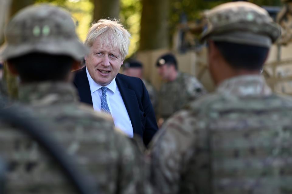 Boris Johnson meets military personnel in Salisbury on Thursday (Ben Stansall)