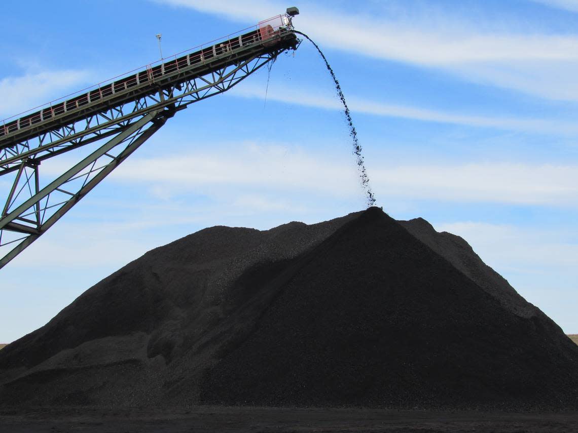 Coal produced at an underground mine in Kentucky poured from the end of a conveyor onto a pile being used to load trucks in December 2018.
