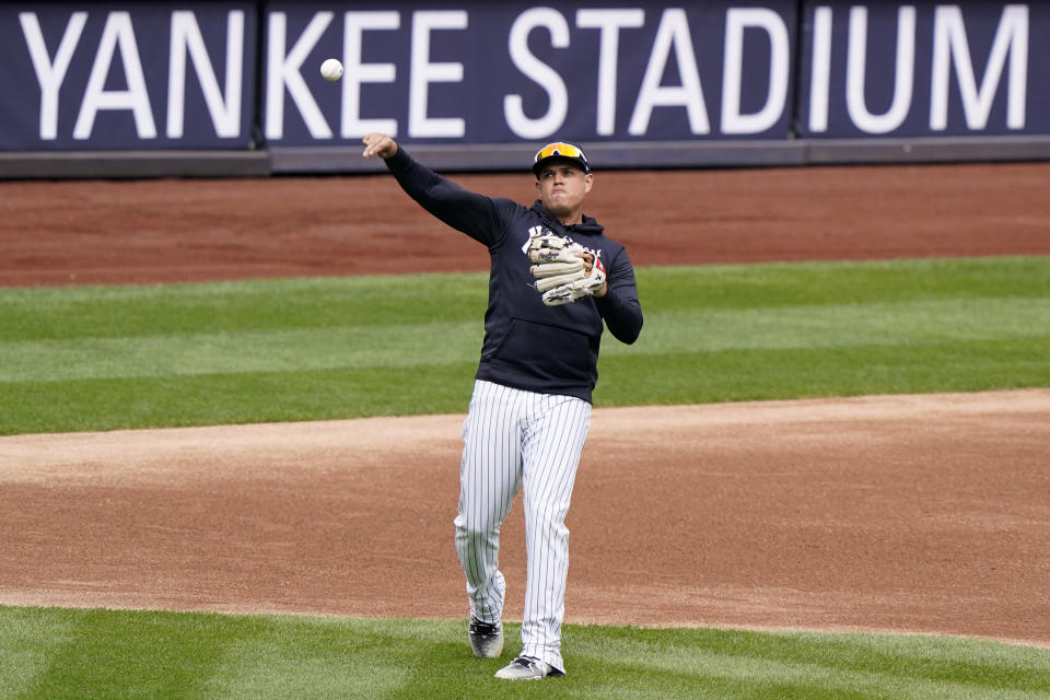 New York Yankees third baseman Gio Urshela (29) throws from his position during a team workout, Wednesday, March 31, 2021, at Yankee Stadium in New York. The Yankees face the Toronto Blue Jays on opening day Thursday. (AP Photo/Kathy Willens)