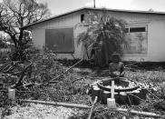 <p>A Buddha statue sits amid storm debris in Goodland, Fla., a city heavily damaged by Hurricane Irma. (Photo: Holly Bailey/Yahoo News) </p>