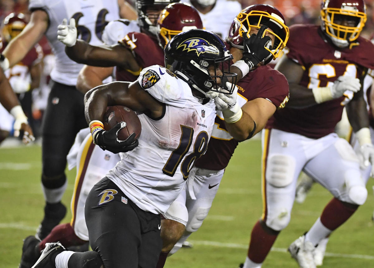 Aug 28, 2021; Landover, Maryland, USA; Baltimore Ravens running back Nate McCrary (18) carries the ball against the Washington Football Team during the second half at FedExField. Mandatory Credit: Brad Mills-USA TODAY Sports (NFL - Green Bay Packers)