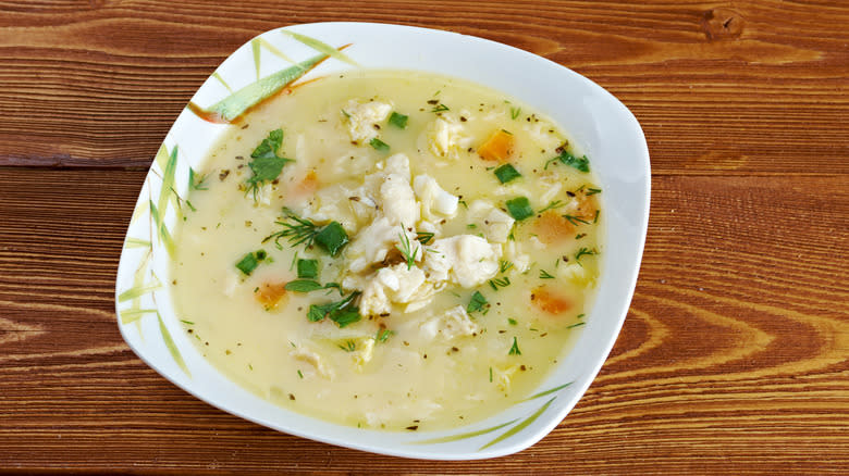 White broth with fish chunks 