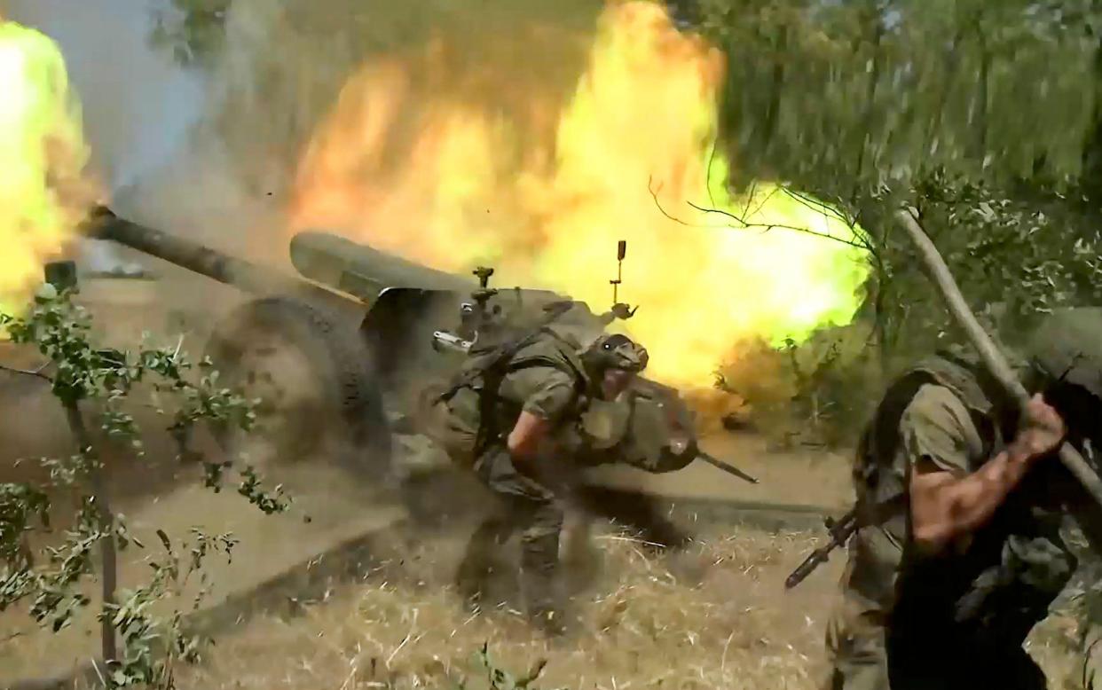 Russian forces fire at a Ukrainian position in the Kursk region