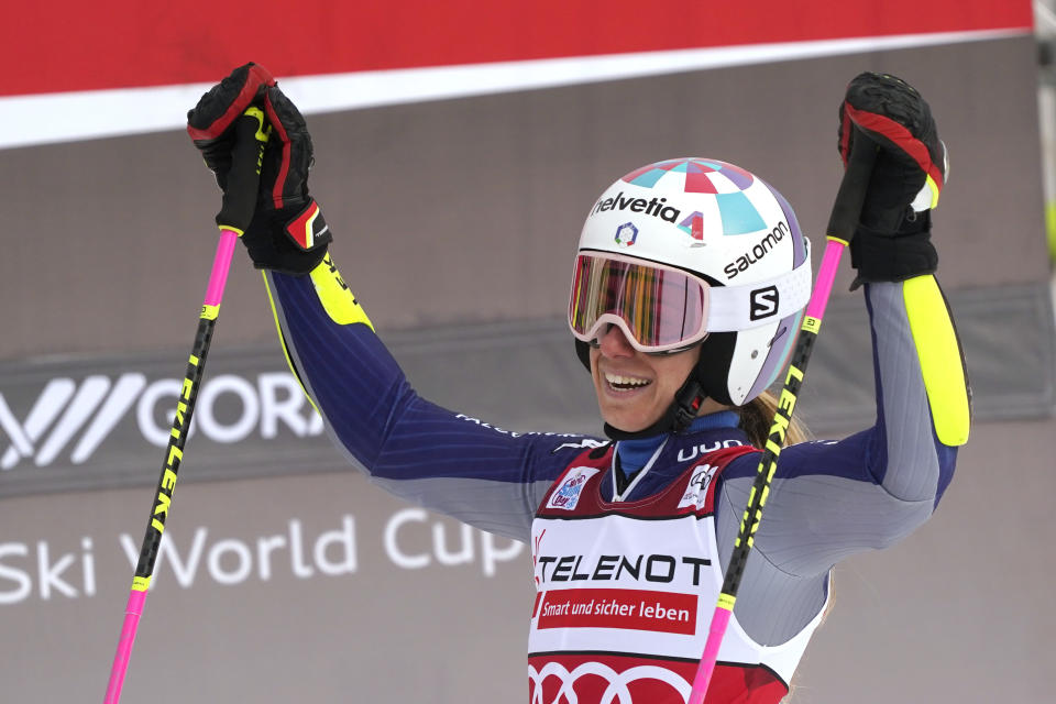 Italy's Marta Bassino celebrates after completing an alpine ski, women's World Cup giant slalom, in Kranjska Gora, Slovenia, Sunday, Jan. 17, 2021. (AP Photo/Giovanni Auletta)