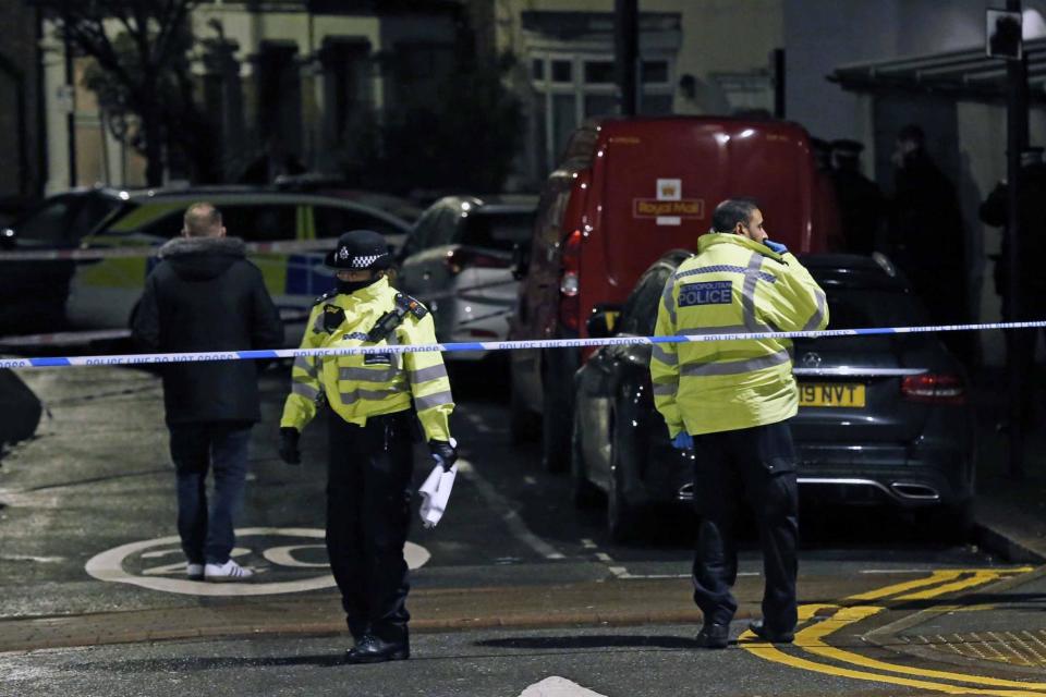 Police at the scene following a fatal stabbing in Walthamstow (NIGEL HOWARD)