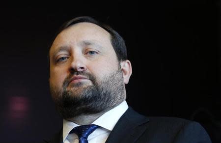 Ukraine's First Deputy Prime Minister Serhiy Arbuzov waits for a meeting with European Enlargement Commissioner Stefan Fule (unseen) at the EU Commission headquarters in Brussels December 12, 2013. REUTERS/Francois Lenoir