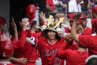 Los Angeles Angels' Shohei Ohtani celebrates in the dugout his second, two-run home run of the game off Chicago White Sox starting pitcher Lance Lynn during the fourth inning of a baseball game Wednesday, May 31, 2023, in Chicago. (AP Photo/Charles Rex Arbogast)
