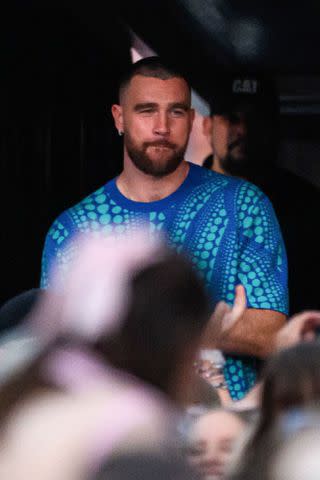 <p>James Gourley/Shutterstock</p> Travis Kelce at the Eras Tour