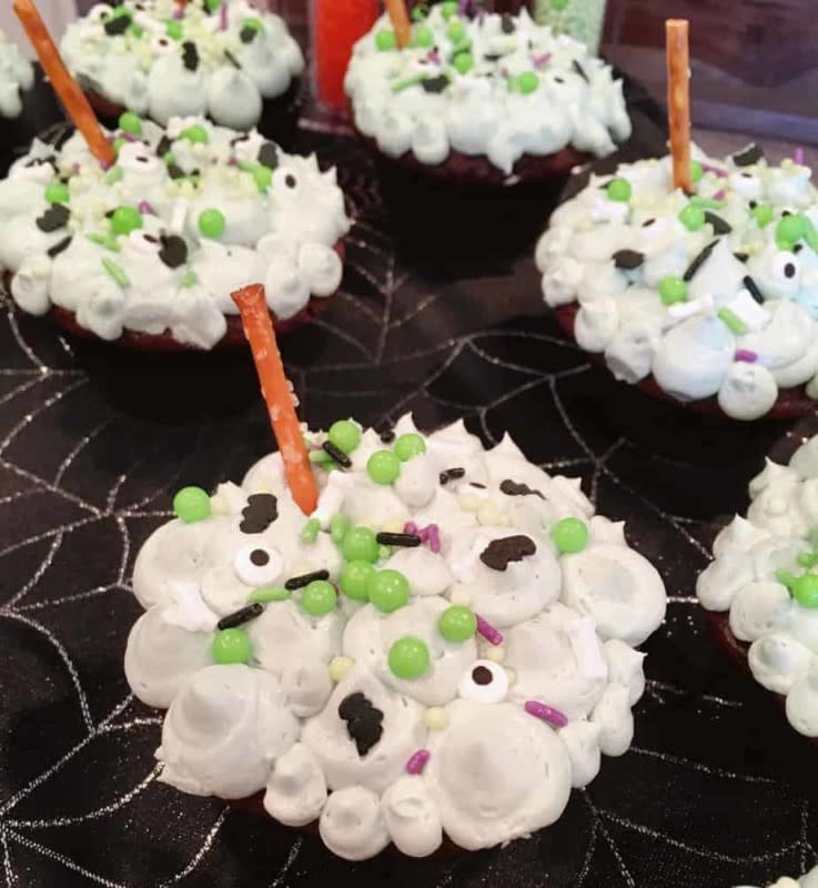 <p>Norine's Nest</p><p>These treats truly take the take as the eeriest cupcakes in the Halloween cupcake game. They're bubbling over with ultra creamy butter cream frosting and topped with candy sprinkles and a pretzel broom handle!</p><p><strong>Get the recipe: <a href="https://www.norinesnest.com/witches-brew-halloween-cupcakes/" rel="nofollow noopener" target="_blank" data-ylk="slk:Witches Brew Cupcakes;elm:context_link;itc:0;sec:content-canvas" class="link ">Witches Brew Cupcakes</a></strong></p>