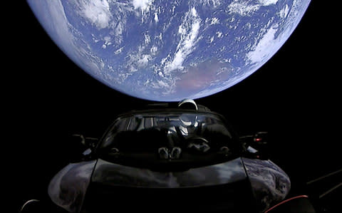 Images show the car in space - Credit:  SpaceX