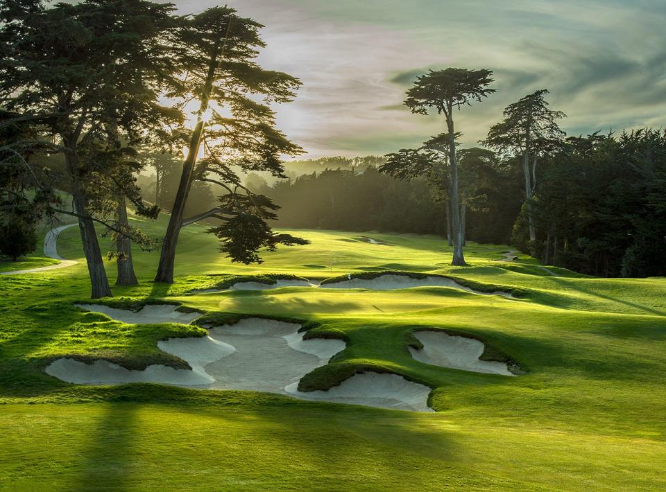 Late day light on the 3rd green in the foreground and par 3 8th green in the distance at The California Golf Club in San Francisco. A wonderful Alister Mackenzie design in the bay area.