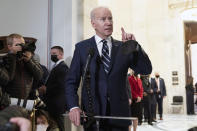 President Joe Biden speaks to the media after meeting privately with Senate Democrats, Thursday, Jan. 13, 2022, on Capitol Hill in Washington. (AP Photo/Jose Luis Magana)