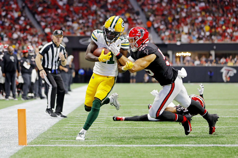 ATLANTA, GEORGIA – SEPTEMBER 17: Jayden Reed #11 of the Green Bay Packers scores a touchdown during the second quarter in the game against the Atlanta Falcons at Mercedes-Benz Stadium on September 17, 2023 in Atlanta, Georgia. (Photo by Todd Kirkland/Getty Images)