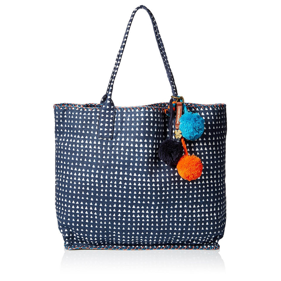 <p>The vibrant, orange and blue stitching and fun pom-poms on this bag prove the devil <em>is</em> indeed in the details.</p> <p><strong>To buy: </strong><a rel="nofollow noopener" href="https://www.amazon.com/dp/B01DUEPOP8/ref=as_at" target="_blank" data-ylk="slk:amazon.com;elm:context_link;itc:0;sec:content-canvas" class="link ">amazon.com</a>, $108</p>