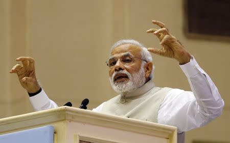 Prime Minister Narendra Modi speaks at the inaugural session of Re-Invest 2015, the first Renewable Energy Global Investors Meet & Expo, in New Delhi, February 15, 2015. REUTERS/Adnan Abidi