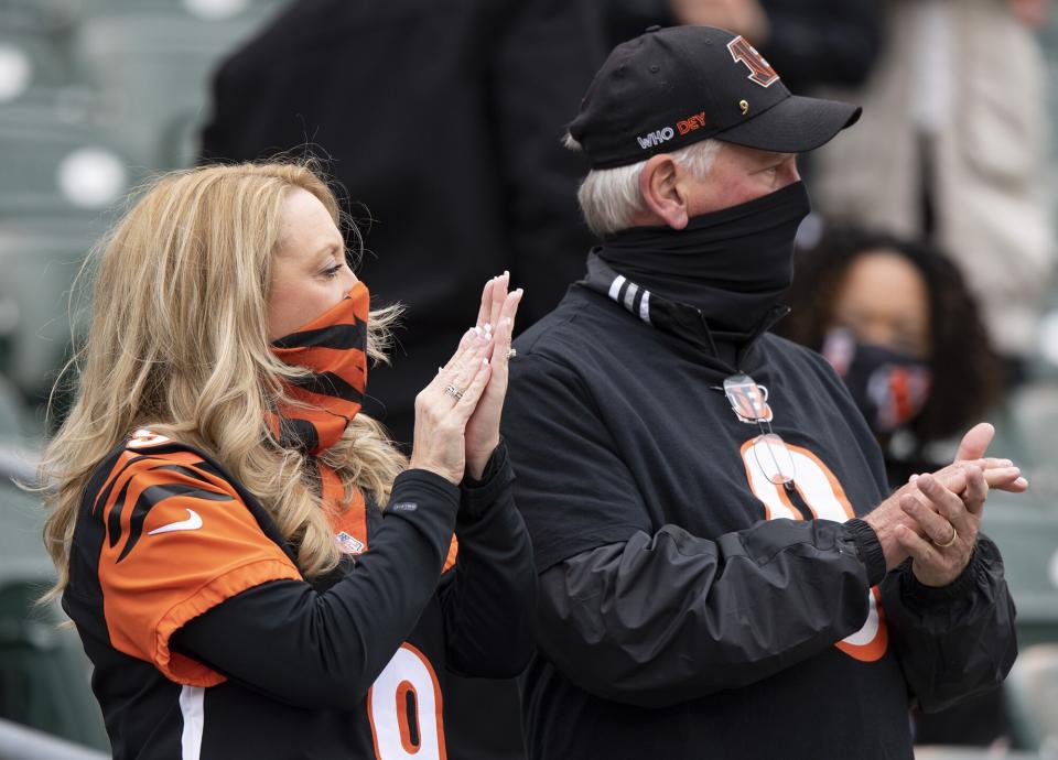 Jim and Robin Burrow, parents of Cincinnati Bengals quarterback Joe Burrow (9), cheer prior to an NFL football game against the Cleveland Browns, in Cincinnati Browns Bengals Football, Cincinnati, United States - 25 Oct 2020