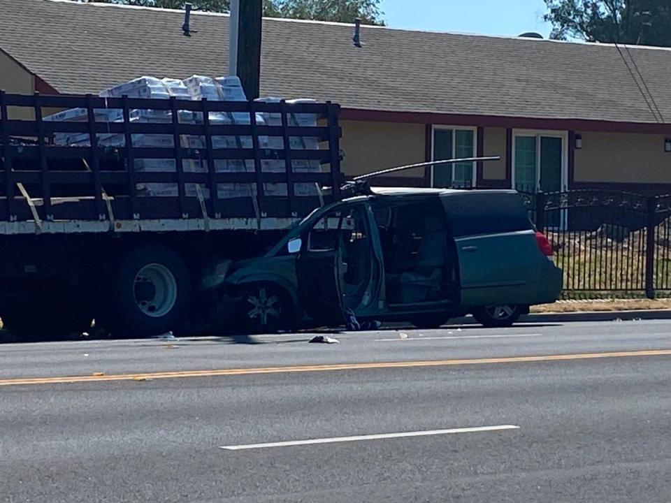 A man was killed when the minivan he was driving slammed into a parked work truck, police said Friday, April 28, 2023.