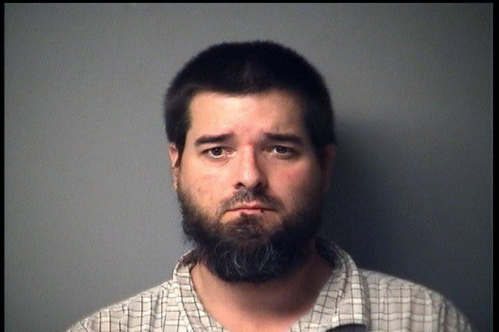 CORRECTS CHARGES - In a photo provided by the Antrim County Sheriff, Eric Molitor is shown in a booking photo. Molitor is one of several charged Thursday, Oct. 8, 2020, in state court for allegedly seeking to storm the Michigan Capitol and seek a “civil war.” (Antrim County Sheriff via AP)