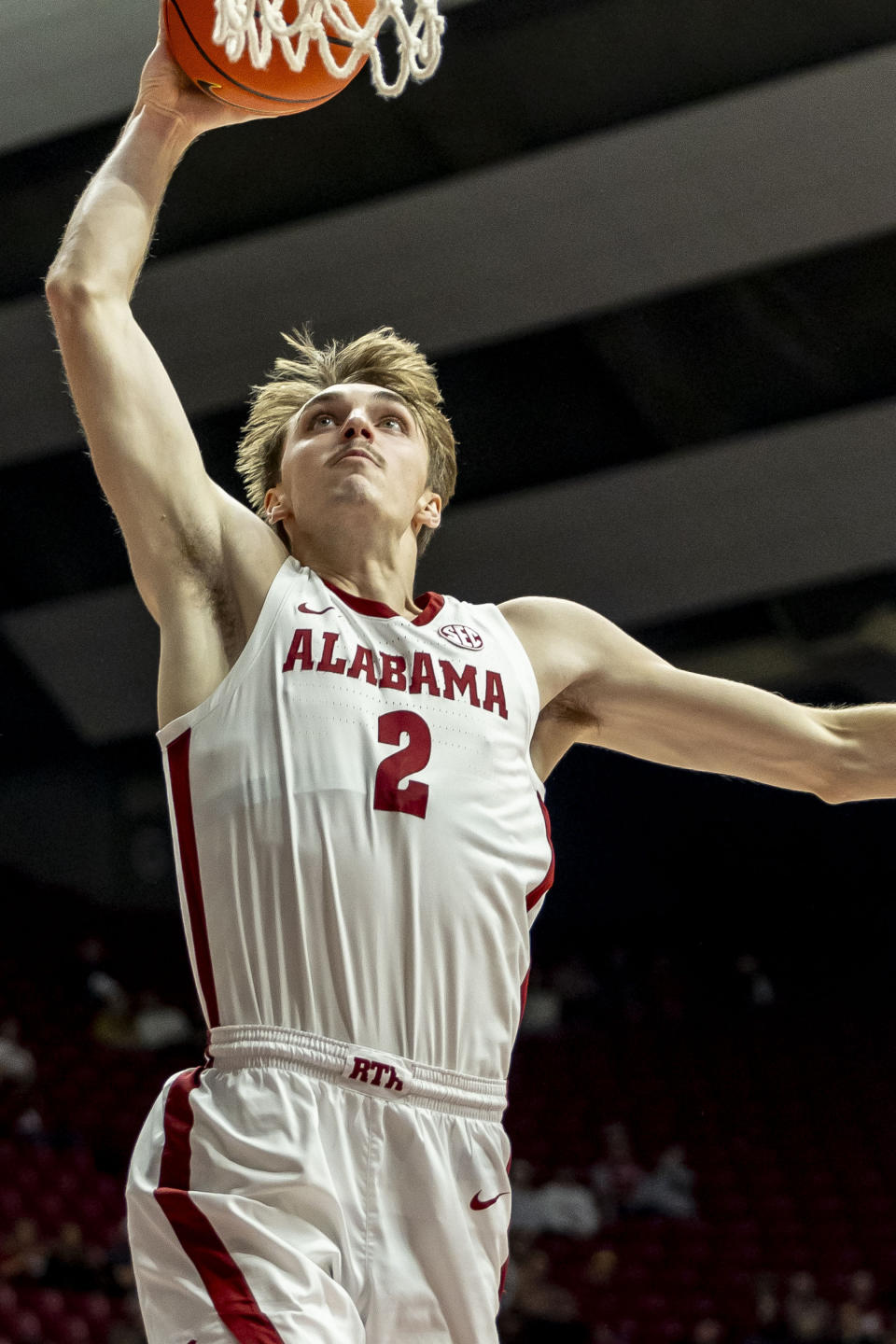 Alabama forward Grant Nelson (2) dunks during the first half of an NCAA college basketball game against Morehead State, Monday, Nov. 6, 2023, in Tuscaloosa, Ala. (AP Photo/Vasha Hunt)