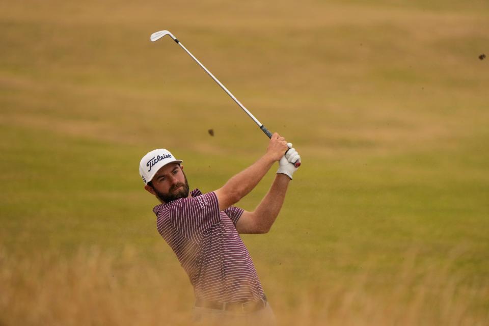 Cameron Young plays out of the rough on the 13th fairway during the final round of the British Open on the Old Course at St. Andrews, Scotland, Sunday, July 17, 2022.