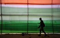 An Assam smart police commando walks after participating in a parade to mark Republic Day in Gauhati, India, Sunday, Jan. 26, 2020. Sunday's event marks the anniversary of the country's democratic constitution taking force in 1950. (AP Photo/Anupam Nath)