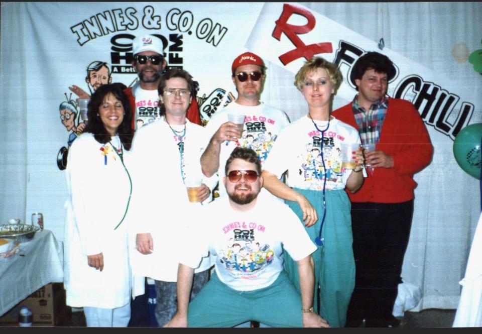 Voice actor and radio personality Scott Innes, center, while working at KKHT 98.5 FM in Springfield. Innes hosted "Innes and Company," a morning show at the radio station, between 1991-1996.