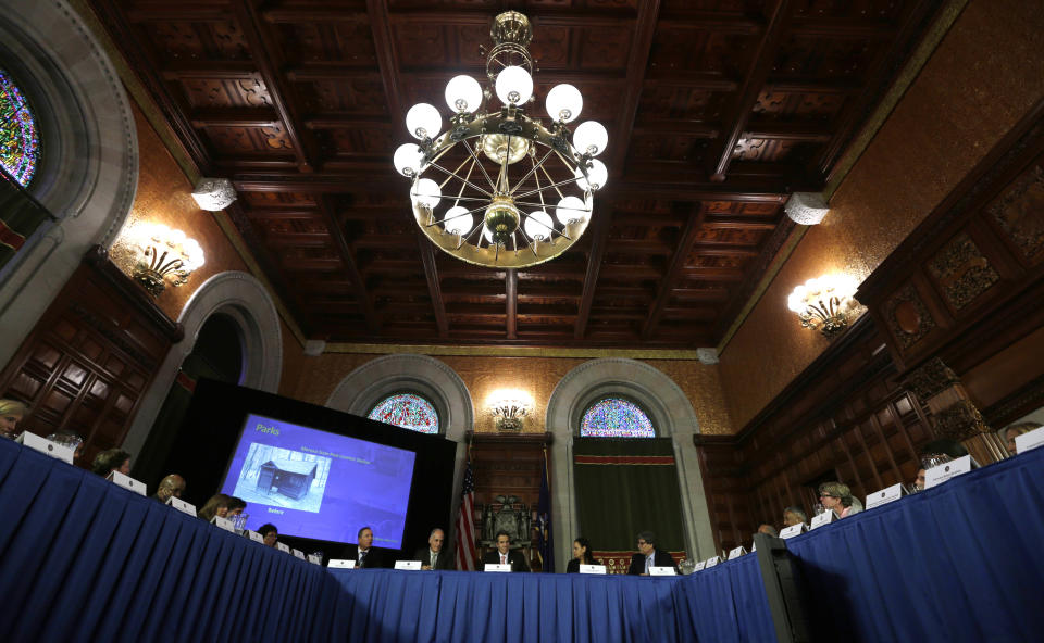 New York Gov. Andrew Cuomo, center, speaks during a cabinet meeting in the Red Room at the Capitol on Thursday, Sept. 27, 2012, in Albany, N.Y. Cuomo is calling a “summit” to boost the beer and wine industries in New York just months after a similar effort began to try to make New York the nation’s largest producer of Greek-style yogurt. (AP Photo/Mike Groll)