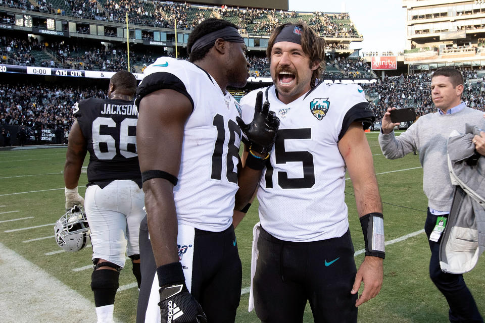 Quarterback Gardner Minshew of the Jacksonville Jaguars and wide receiver Chris Conley celebrate after their win against the Oakland Raiders on Sunday.