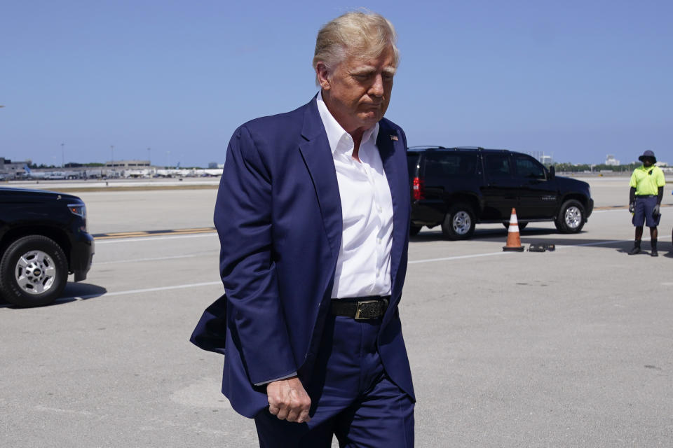 FILE - Former President Donald Trump walks to board his airplane for a trip to a campaign rally in Waco, Texas, at West Palm Beach International Airport, Saturday, March 25, 2023, in West Palm Beach, Fla. (AP Photo/Evan Vucci, File)