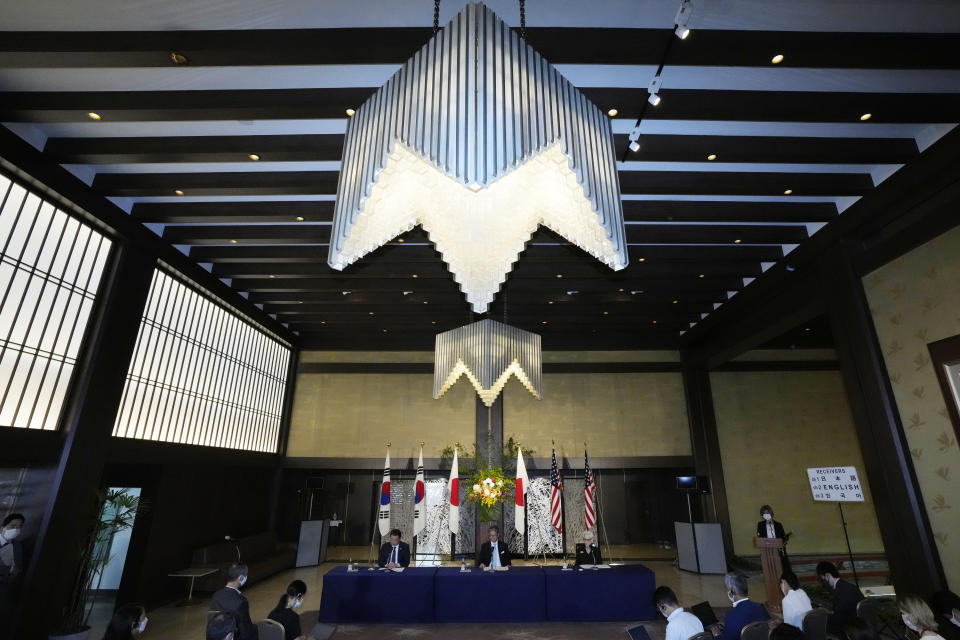 U.S. Deputy Secretary of State Wendy Sherman, right, South Korean First Vice Foreign Minister Choi Jong Kun, left, and Japanese Vice-Minister for Foreign Affairs Takeo Mori, center, attend a press conference after their trilateral meeting at the Iikura Guesthouse Wednesday, July 21, 2021, in Tokyo. (AP Photo/Eugene Hoshiko)