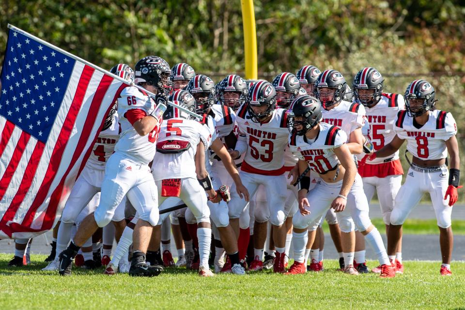 Wallkill Valley hosts Boonton in a football game in Hamburg, NJ, on Oct. 2, 2021. Boonton makes its entrance onto the field.