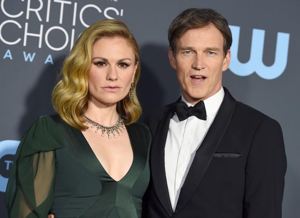 Anna Paquin, left, and Stephen Moyer arrive at the 24th annual Critics' Choice Awards on Sunday, Jan. 13, 2019, at the Barker Hangar in Santa Monica, Calif. (Photo by Jordan Strauss/Invision/AP) ORG XMIT: CAPM318