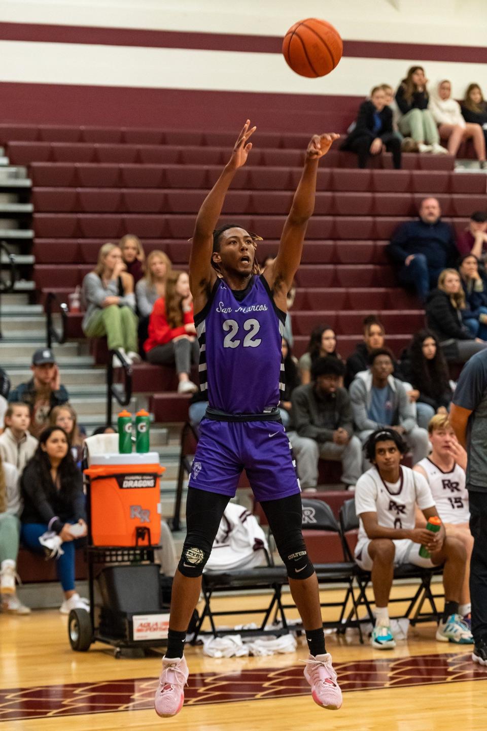 Malik Presley takes a 3-point shot for San Marcos in a win over Round Rock earlier this season. Presley is one of three Austin-area boys to receive a McDonald's All-American nomination on Wednesday.