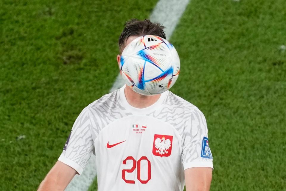 Poland's Piotr Zielinski controls the ball during the World Cup group C football match between Mexico and Poland, at the Stadium 974 in Doha, Qatar, Tuesday, Nov. 22, 2022. (AP Photo/Darko Vojinovic)