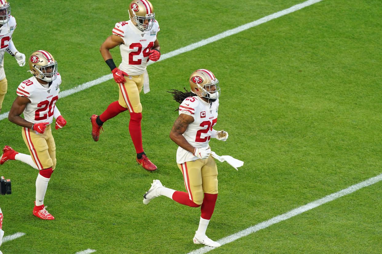 San Francisco 49ers free safety Jimmie Ward (20), San Francisco 49ers cornerback Richard Sherman (25), San Francisco 49ers defensive back K'Waun Williams (24) and teammates take the field prior to the start of Super Bowl LIV game between the Kansas City Chiefs and the San Francisco 49ers on February 2, 2020 at Hard Rock Stadium, in Miami Gardens, FL. 