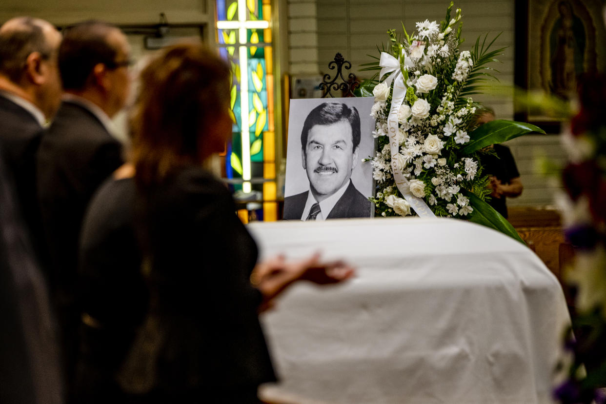 Family members pray during the funeral service for Ernest Robles, 91, founder of the National Hispanic Scholarship Fund, at Holy Name of Jesus Church on Sept. 26, 2022 in Redlands, Calif. (Gina Ferazzi / Los Angeles Times via Getty Images file)