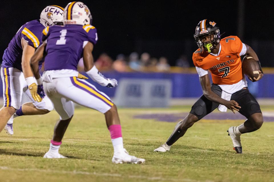 Hawthorne’s quarterback CJ Ingram runs the ball at Union County High School in Lake Butler, FL on Friday, October 14, 2022. [Jesse Gann/Gainesville Sun]