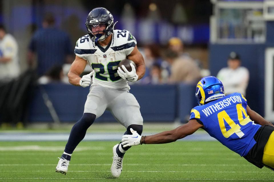 Seahawks rookie Zach Charbonnet posted career highs in both rushing attempts (15) and receptions (6) on Sunday vs. the Rams.