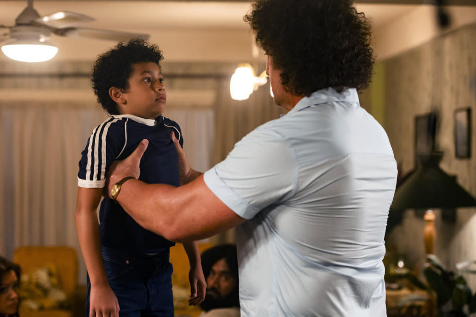 This image released by NBC shows Adrian Groulx as Dwayne Johnson, left, and Matthew Willig as Andre The Giant, in a scene from "Young Rock," premiering Feb. 16 on NBC. (Mark Taylor/NBC via AP)