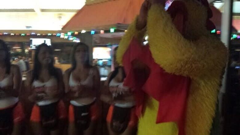 Chicken suited man dancing at Hooters
