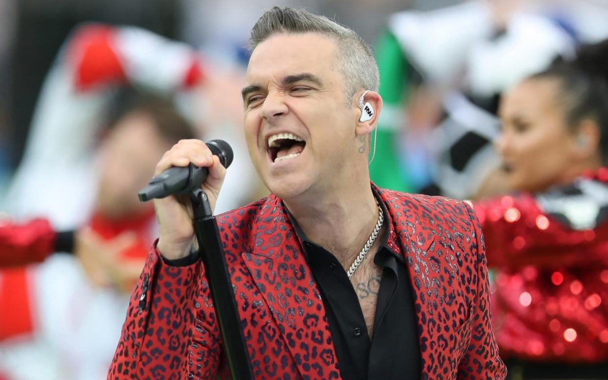 Robbie Williams performing at the opening match of the 2018 Fifa World Cup - Getty Images Europe