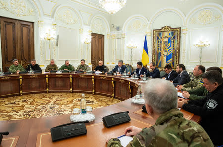 Ukrainian President Petro Poroshenko chairs a meeting with members of the National Security Council in Kiev, Ukraine November 26, 2018. Mykhailo Markiv/Ukrainian Presidential Press Service/Handout via REUTERS