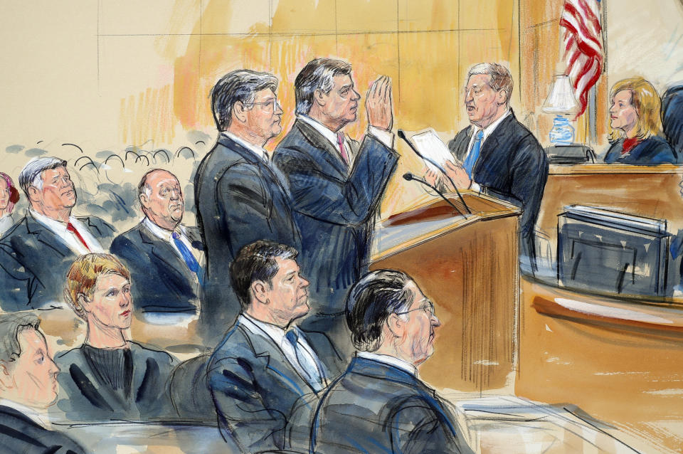 This courtroom sketch depicts former Donald Trump campaign chairman Paul Manafort, center, and his defense lawyer Richard Westling, left, before U.S. District Judge Amy Berman Jackson, seated upper right, at federal court in Washington, Friday, Sept. 14, 2018, as prosecutors Andrew Weissmann, bottom center, and Greg Andres watch. Manafort has pleaded guilty to two federal charges as part of a cooperation deal with prosecutors. The deal requires him to cooperate "fully and truthfully" with special counsel Robert Mueller's Russia investigation. The charges against Manafort are related to his Ukrainian consulting work, not Russian interference in the 2016 presidential election. (Dana Verkouteren via AP)