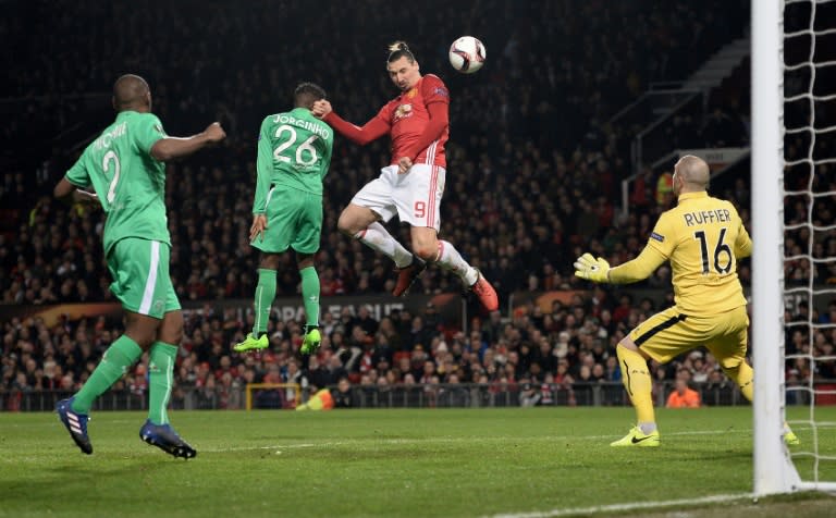 Manchester United's Zlatan Ibrahimovic (C) heads the ball to score but is ruled offside during their UEFA Europa League round of 32 first-leg match against Saint-Etienne, at Old Trafford stadium in Manchester, on February 16, 2017