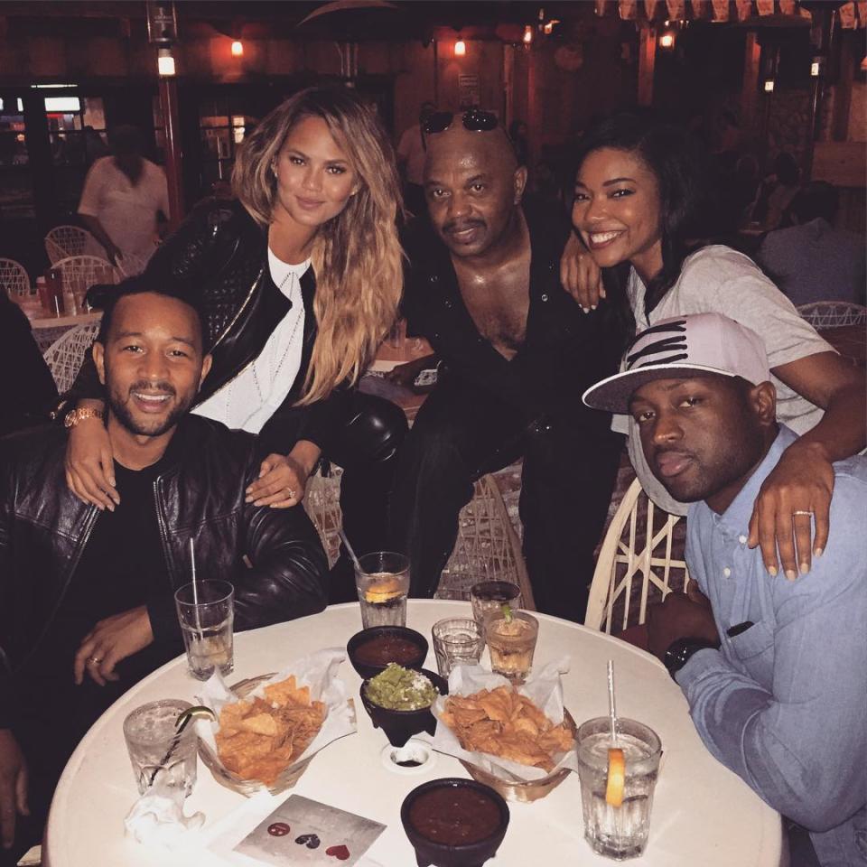 Double date alert! John Legend and wife Chrissy Teigen were joined by Dwyane Wade and Gabrielle Union for what looks like a groovin' good night, and we've got to be honest -- we are So. Totally. Envious. <strong> WATCH: NSFW! Chrissy Teigen Goes Topless for 'W,' Fights With Instagram to Post It</strong> Look at how much fun the "All of Me" singer had as he and Gabrielle bounced and let their hips loose in the video Chrissy posted to her Instagram Friday night. The best part, though? That big giggly grin on Dwyane's face as he watched his wife and John show off their smooth moves. The NBA star loved it as much as us! The double date cuteness didn't stop there, either. Chrissy also posted a photo of the smiling couples. And why wouldn't they be? We'd be happy too if we were hanging out with these four. "Then we became band groupies," Teigen wrote on Instagram. Not only are Chrissy, 29, and Gabrielle, 42, pals, they're also married to two of the hunkiest men on the planet. Chrissy and John met on the set of his 2007 music video "Stereo," and wed in 2013. As for Gabrielle and Dwyane, 33, they married in 2014 after a years-long on-and-off relationship. <strong> WATCH: Gabrielle Union Calls Dwyane Wade an 'Old Geezer' In Epic Videobomb </strong> So just how close is this crew of four? John Legend sang his hit single "All of Me" during Gabrielle and Dwyane's wedding! Yes, that's the song John wrote for his own wife. Aren't you just melting right now? Chrissy Teigen really has been too good to us lately -- and not just by going on double dates and inspiring our own relationship goals. First, she made our dreams come true when she Instagrammed a pic of husband John Legend's butt (we still can't thank you enough for that, Chrissy). Then she showed us that all things are possible, including balancing a plate of chicken wings on your butt, as she did. Then, she elicited laughs as a weather reporter. Oh, and did we mention that she instagrammed a pic of John Legend's butt? <strong> WATCH: Chrissy Teigen Explains the John Legend Naked Butt Pic: We Had a Few Glasses of Wine!</strong> Recently, Teigen showed off her own assets while in Miami. See for yourself in the video below: