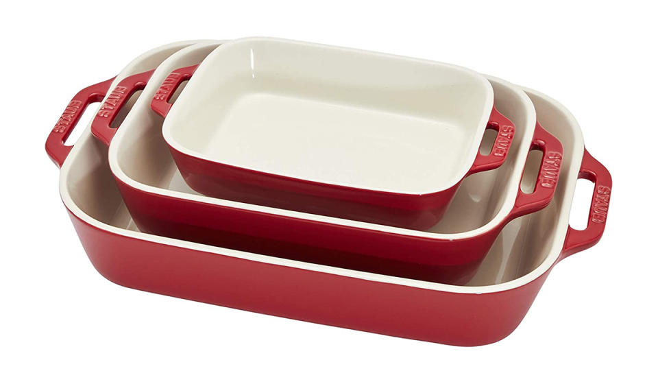 Set of three red nesting baking dishes with handles