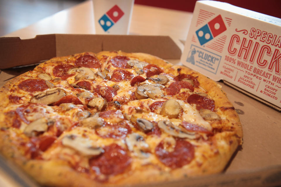 CHICAGO, IL - OCTOBER 12:  Domino's menu items are shown on October 12, 2017 in Chicago, Illinois. Shares of the restaurant chain fell 4 percent today despite reporting an increase of more than 8 percent in domestic same-store sales.  (Photo Illustration by Scott Olson/Getty Images)